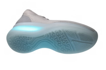 Sneaker with glowing blue sole, futuristic footwear design for modern fashion and technology, transparent background