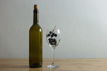 bottle of wine and glass