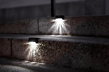 Modern solar lights with sleek design and bright illumination. Eco-friendly outdoor lighting powered by renewable solar energy for gardens, streets, or pathways.