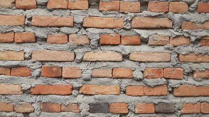 Obraz premium red bricks and cement, abstract background