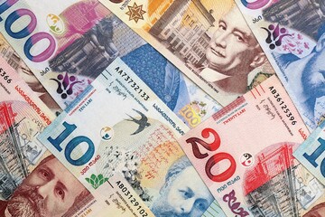 Georgian Lari currency money bills. GEL currency banknotes in big amount with different denomination close up