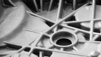 metal piece with a pattern created by a 3D printer. lines are arranged in a spiral pattern, creating a sense of movement and energy. Adaptive technologies concept background