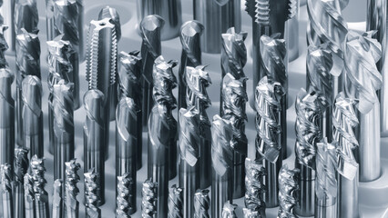 Tool drills, milling cutters for metalworking CNC multifunctional milling drilling grinding tool automatic machine, industrial concept background.