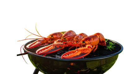 Grilled lobsters in various shades of red on a black barbecue, top view