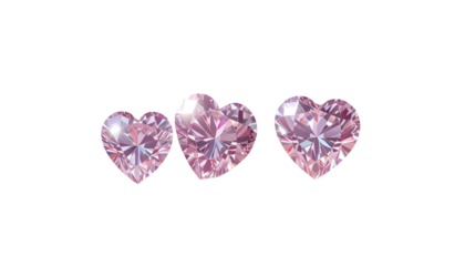 Three heart-shaped, shimmering, light-pink gems against a black background