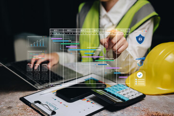 Project management concept. Engineer analyzing digital Gantt chart with data visualization for construction planning, scheduling, and performance monitoring using technology tools.