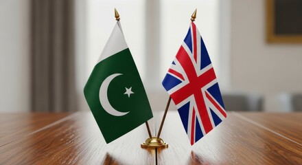 Flags of Pakistan and United Kingdom: Symbolic representation of diplomacy, international relations, and cooperation, a visual narrative of the ties between Pakistan and the United Kingdom.
