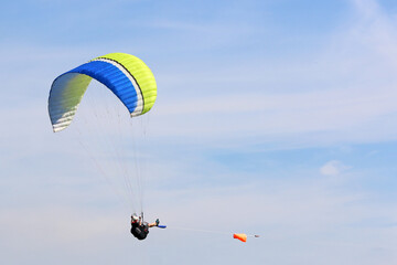 Paraglider being towed by a winch	
