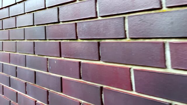 Close up view of modern brick brown wall