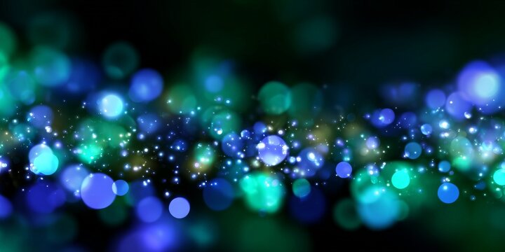 Abstract bokeh lights in blue and green with sparkling effects