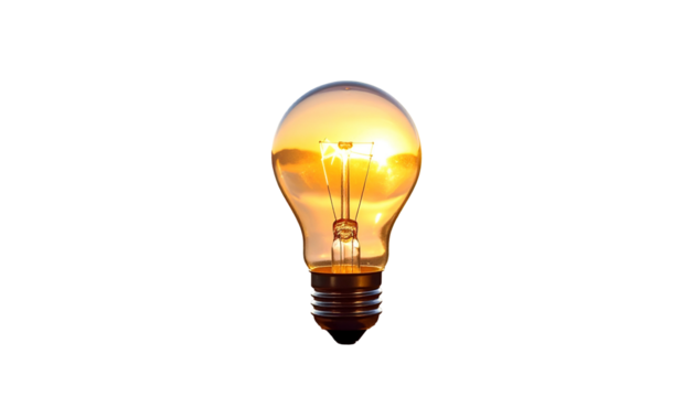 A classic lightbulb with the brilliant golden light of a sunset encapsulated within
