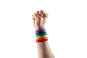 Hand fist with colorful rainbow LGBT wristband isolated on white background with clipping path.