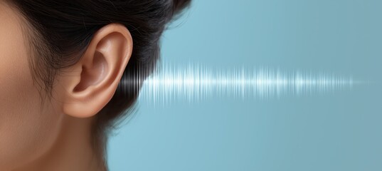 photo of a woman's ear with an audio wave in the background, representing talking to her ears on a light blue and white color solid background, with space for text. 