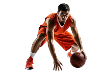 Intense basketball player in an orange uniform dribbling low to the ground