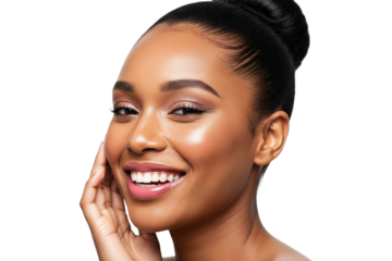 Happy African American woman with glowing skin and a beautiful smile touching her face