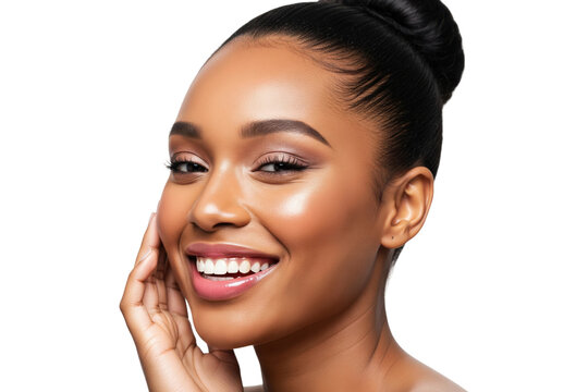 Happy African American woman with glowing skin and a beautiful smile touching her face