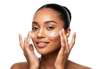 Happy African American woman applying stripes of sunscreen on her face for sun protection