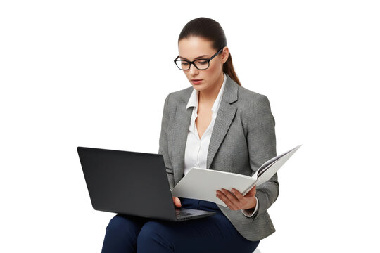 Businesswoman multitasking with a laptop and documents