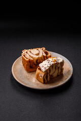 Cinnabon, a sweet cinnamon pastry, a high calorie bun or roll. Cinnabon with cinnamon