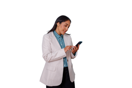 Young businesswoman using a mobile phone, texting, and browsing on an isolated transparent background