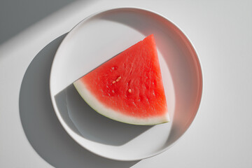 Single Watermelon Slice on Clean White Background