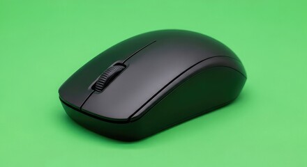 Sleek modern black computer mouse on vibrant green background for technology concepts
