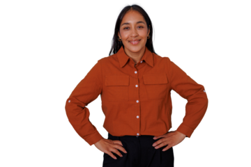Young smiling woman standing with hands on hips, expressing confidence and corporate professionalism, transparent background