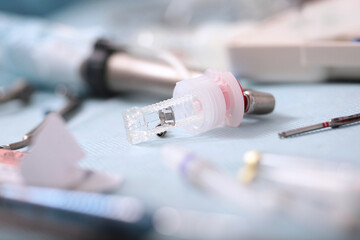 Container for a dental implant. Dental implant surgery. Modern dentistry. Dental implant. The concept of healthcare.