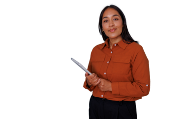 Young businesswoman with dark hair holding a digital tablet, smiling confidently at the camera. Transparent background