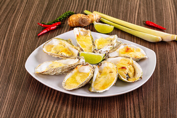 Gourmet baked oysters with cheese