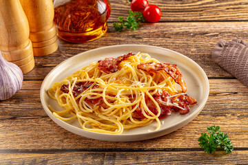 Italian classic spaghetti carbonara with bacon and egg