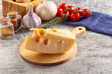 Yellow maasdam cheese triangle piece