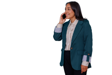 Businesswoman standing and talking on a smartphone, smiling while making a phone call, connecting with colleagues and customers