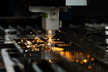 Modern metalworking plant CNC milling machine. Processing and laser cutting for metal in the industrial. Motion blur. Industrial exhibition of machine tools.