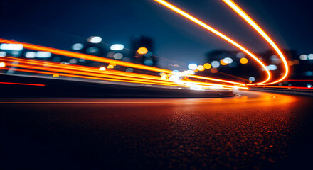 Blurred Motion of Orange Light Trails on Wet City Road at Night (Alternative: Long Exposure of Speed and Urban Transportation in a Metropolis)