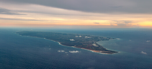 Aerial view of Aruba coastline and Caribbean Sea at sunset