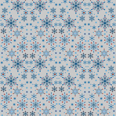 Seamless pattern of blue snowflakes on gray background. Winter seasonal snowfall background. Snowflakes with six rays. Christmas ornamental decor in classic colors