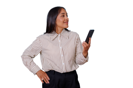 Professional asian woman in striped shirt smiling, holding smartphone, looking confidently to the side