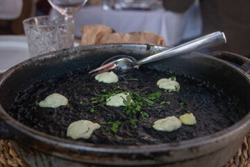 arros negre, black rice paella