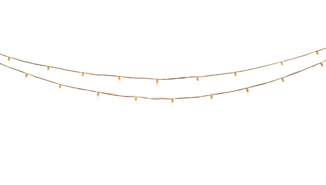 Two strands of warm white string lights hanging against a space