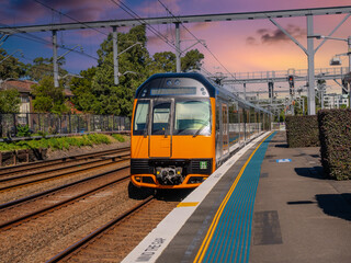 Naklejka premium Passenger Train going through Summer Hill train station a suburban Sydney train Station NSW Australia
