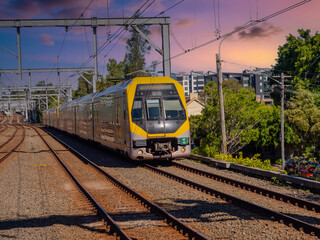 Fototapeta premium Passenger Train going through Summer Hill train station a suburban Sydney train Station NSW Australia