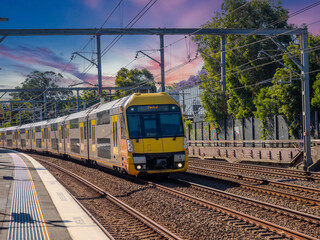 Passenger Train going through Summer Hill train station a suburban Sydney train Station NSW Australia