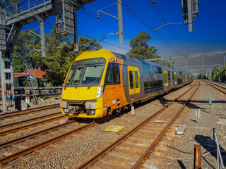Fototapeta premium Passenger Train going through Summer Hill train station a suburban Sydney train Station NSW Australia