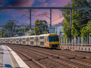 Passenger Train going through Summer Hill train station a suburban Sydney train Station NSW Australia