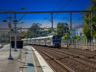 Passenger Train going through Summer Hill train station a suburban Sydney train Station NSW Australia