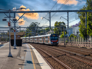 Passenger Train going through Summer Hill train station a suburban Sydney train Station NSW Australia