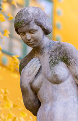 Naked female statue hold her breast symbol of breast cancer