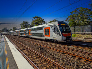Passenger Train going through Summer Hill train station a suburban Sydney train Station NSW Australia