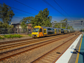 Naklejka premium Passenger Train going through Summer Hill train station a suburban Sydney train Station NSW Australia